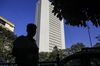 A pedestrian passes the Reserve Bank of India (RBI) headquarters in Mumbai, India, on Tuesday, Dec. 11, 2018. Urjit Patels shock exit as Indias central bank governor roiled financial markets already nervous about early election results showing Prime Minister Narendra Modis ruling party losing support in key states.