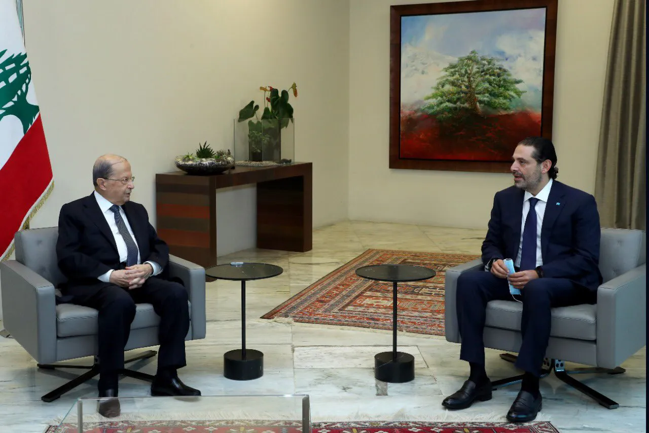 Michel Aoun, left and Saad Hariri at the Presidential Palace in Beirut, Lebanon, on Oct. 22.