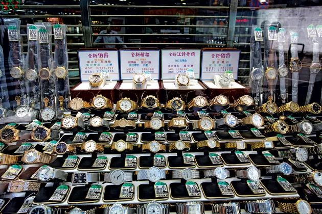A pawnshop display in Macau, offering a watch for MOP 3,399,400—$425,369
