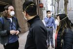 People wear masks in San Francisco, on Nov. 15.