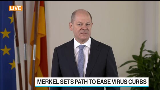 Scholz Says Germany Will Lift Debt Spending to Tackle Virus