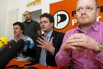 The Pirate Party's Andreas Baum, Sebastian Nerz, and Bernd Schloemer address a press conference at the party headquarters in Berlin