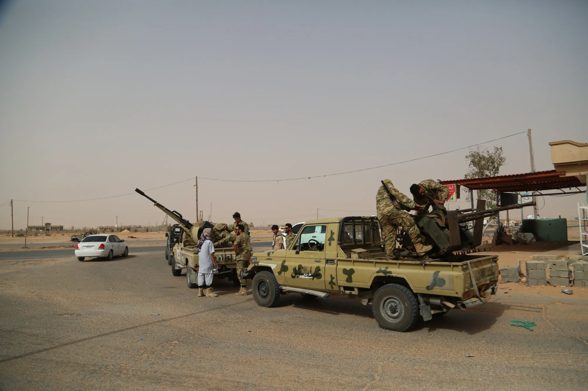 Libyan Army members prepare on the front line outside Sirte, Libya, on June 14, 2020.