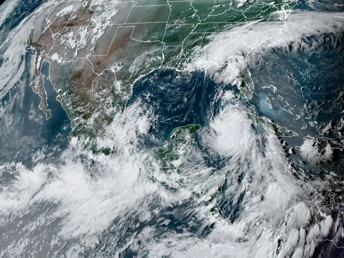Tropical Storm Laura approaches the Gulf of Mexico on Aug. 24.
