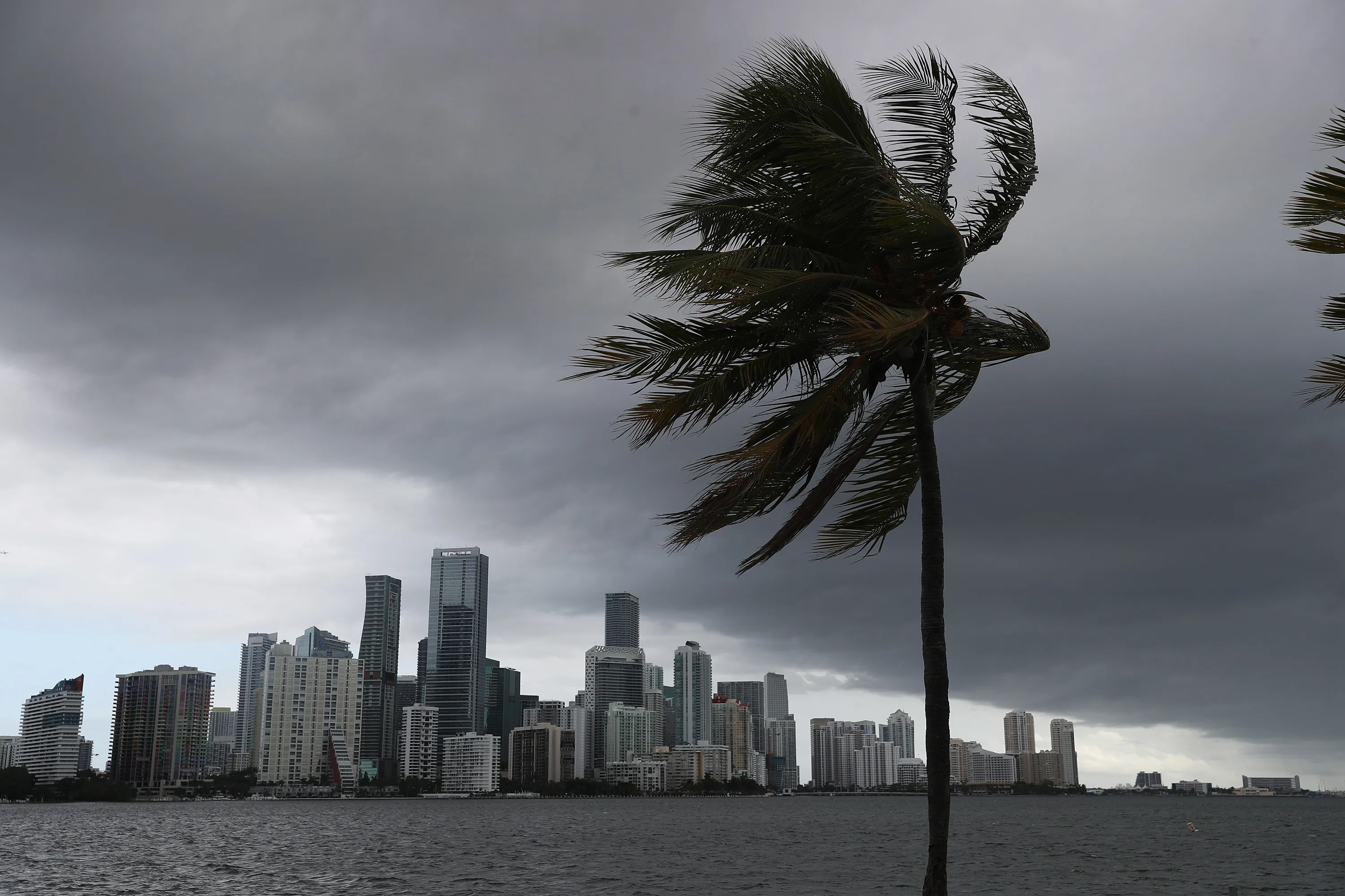 Storm clouds are seen over the city as Hurricane Isaias approaches the east coast of Florida, Aug. 1.