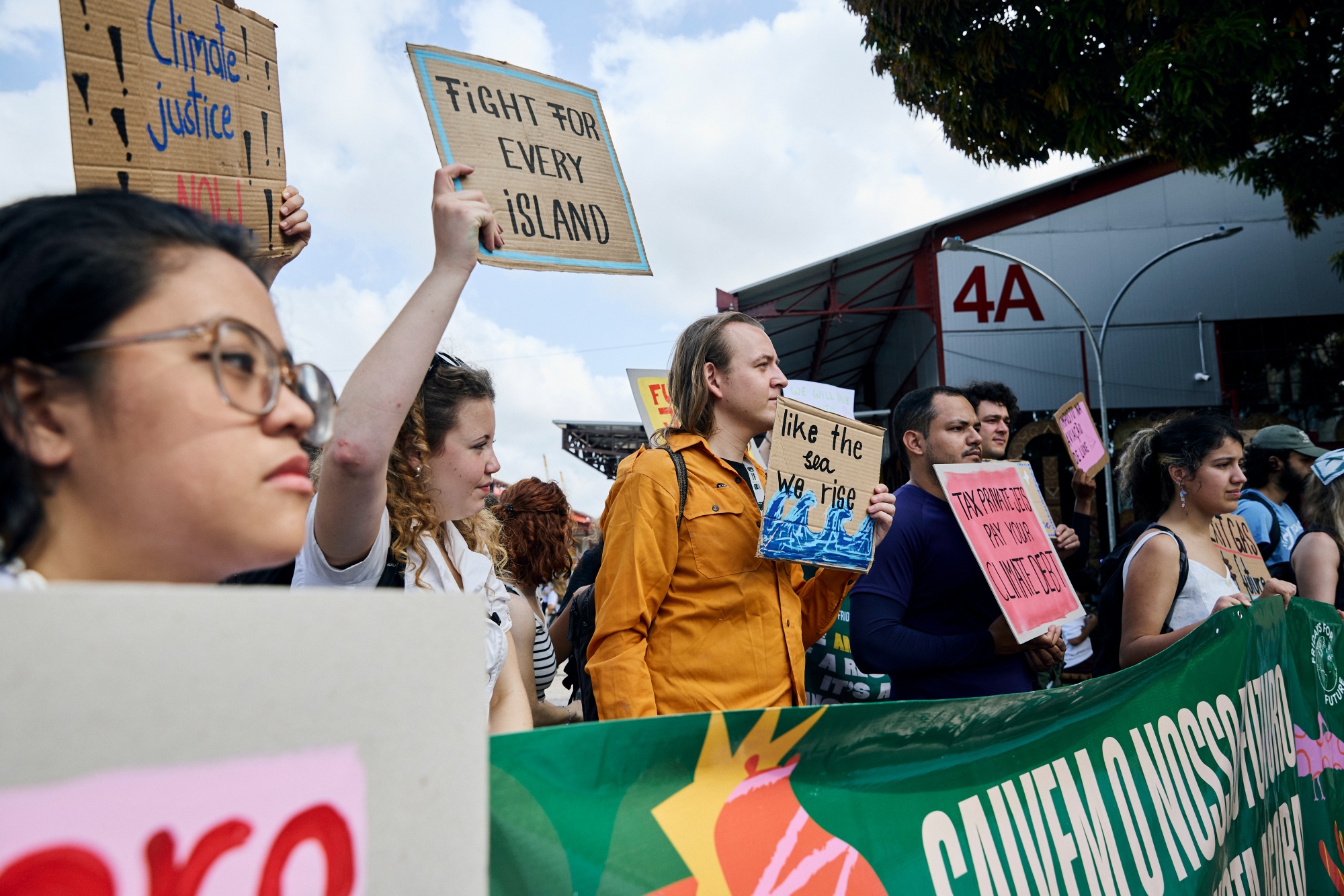 Demonstrators rally during the Fridays For Future Global Climate Strike on the sidelines of the COP30 climate summit in Belem, Para state, Brazil, on Friday, Nov. 14, 2025. Delegates from nearly 200 countries have gathered in Belem in the Brazilian Amazon for the United Nations COP30 climate conference, running through Nov. 21. Photographer: Marina Calderon/Bloomberg