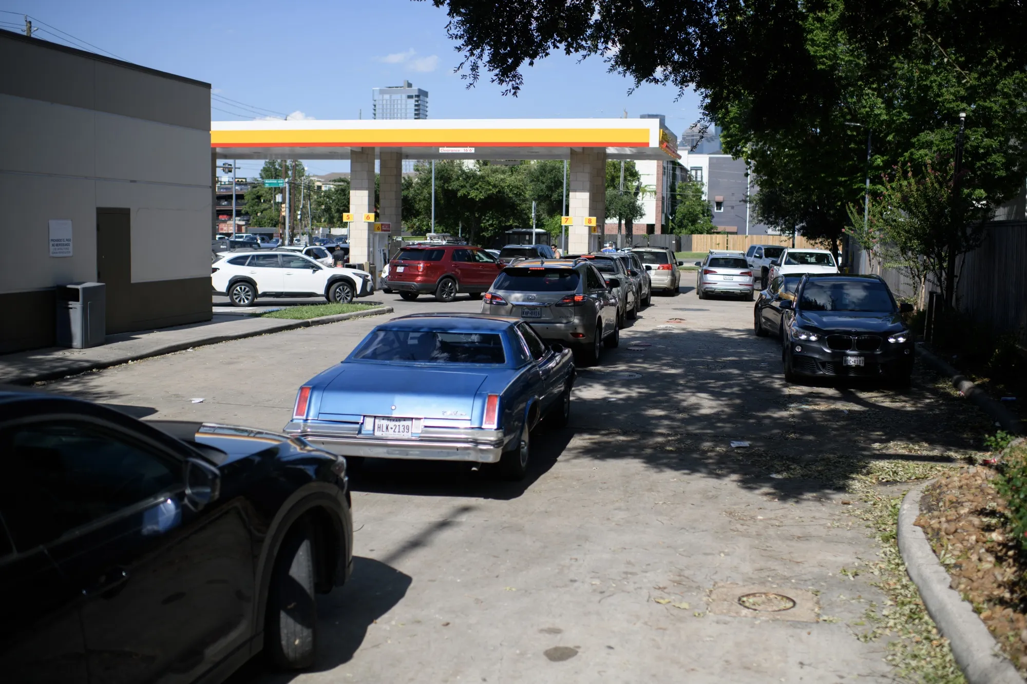 Vehicles at a gas station in Houston, Texas.