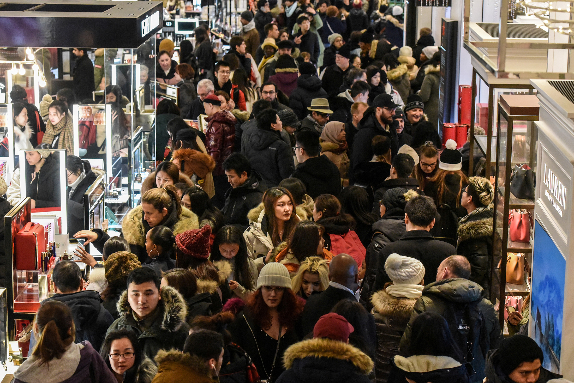 Looking down on shoppers interior of London shopping mall at