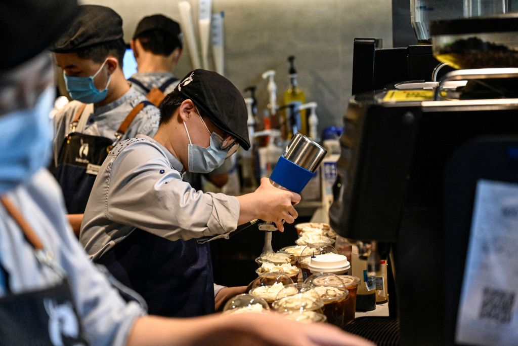 Employees at Luckin Coffee in Beijing&nbsp;preparing&nbsp;lattes.