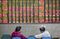 Investors Watch Stock Boards At A Security Firm