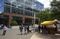 People walk outside of office buildings at the Amazon headquarters in the South Lake Union neighborhood of Seattle.