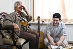 Student Jordi Pronk shares a laugh with a fellow resident of the Humanitas home.