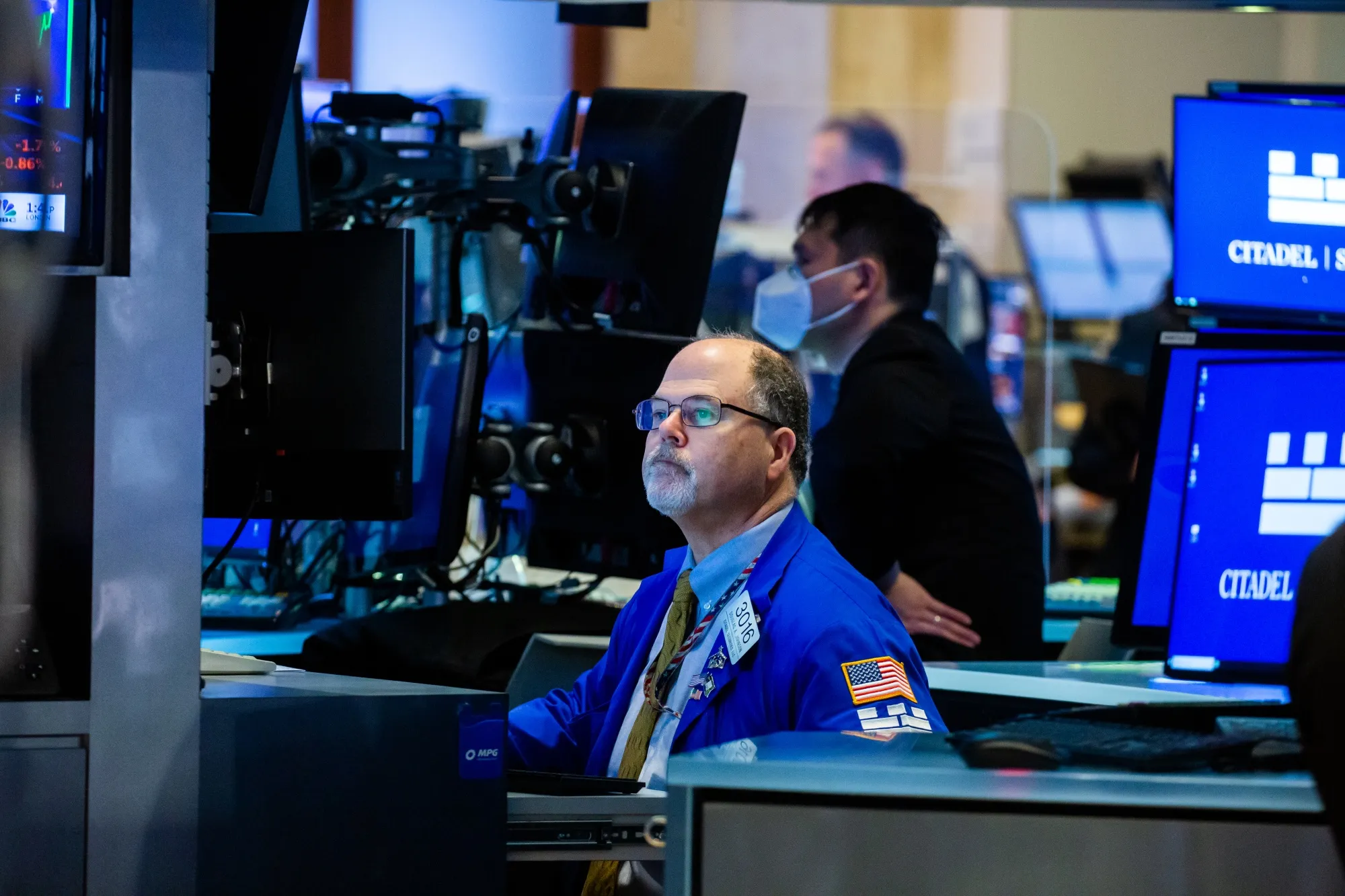 A trader works on the floor of the New York Stock Exchange.