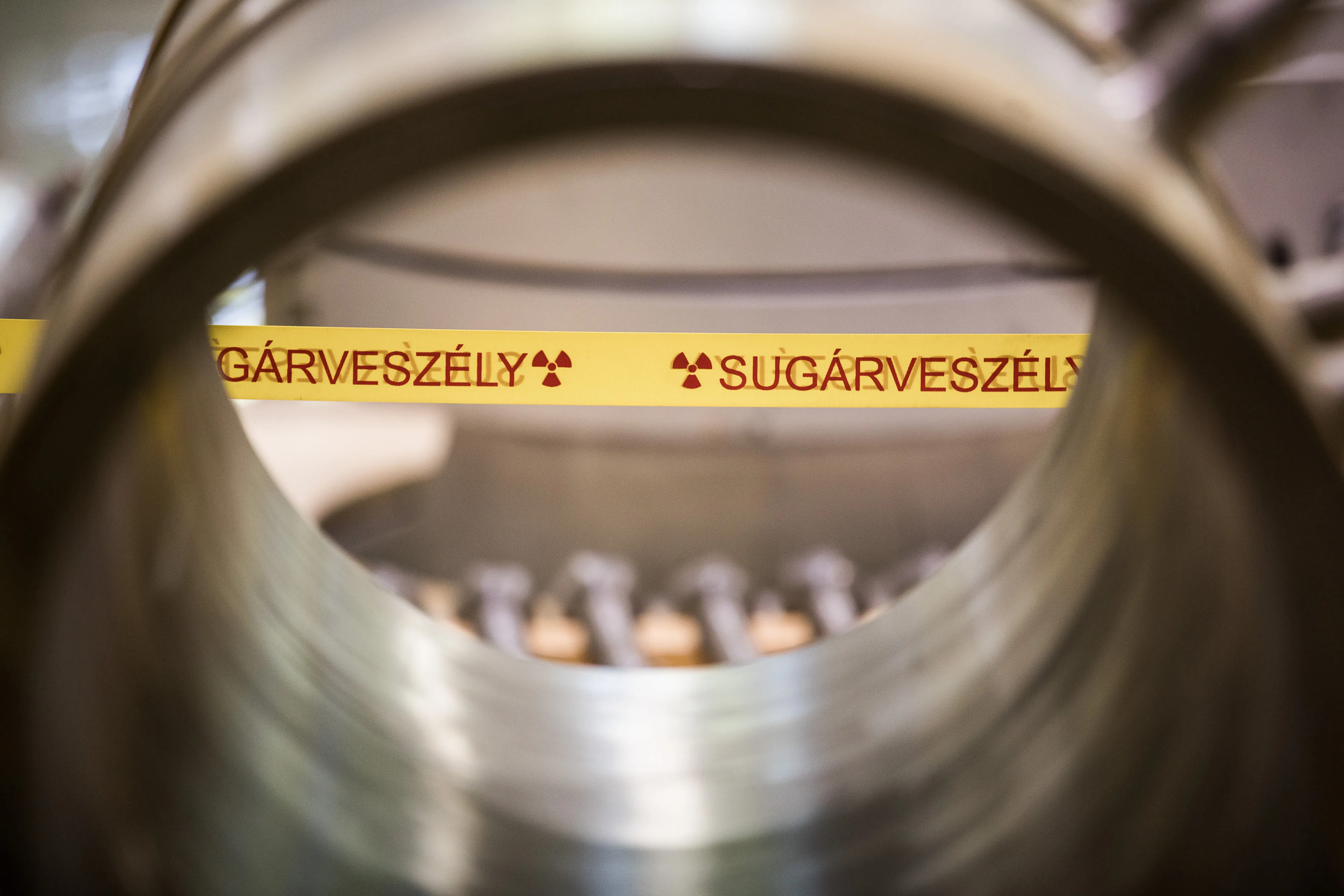 Warning tape hangs inside the Paks nuclear power plant.