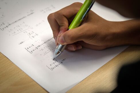 A student studies during a maths class.