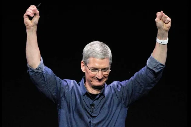 Tim Cook gestures after unveiling the Apple Watch