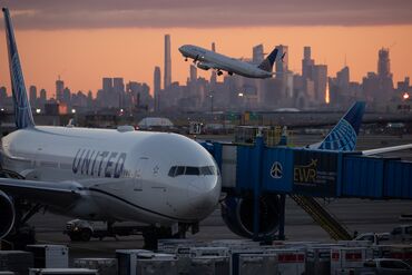 Travelers At Newark Liberty International Airport