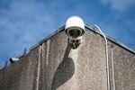 A closed-circuit television (CCTV) security camera monitors the exterior of the Rabobank Group money laundering investigation facility in Zeist, Netherlands, on Tuesday, July 9, 2019. 