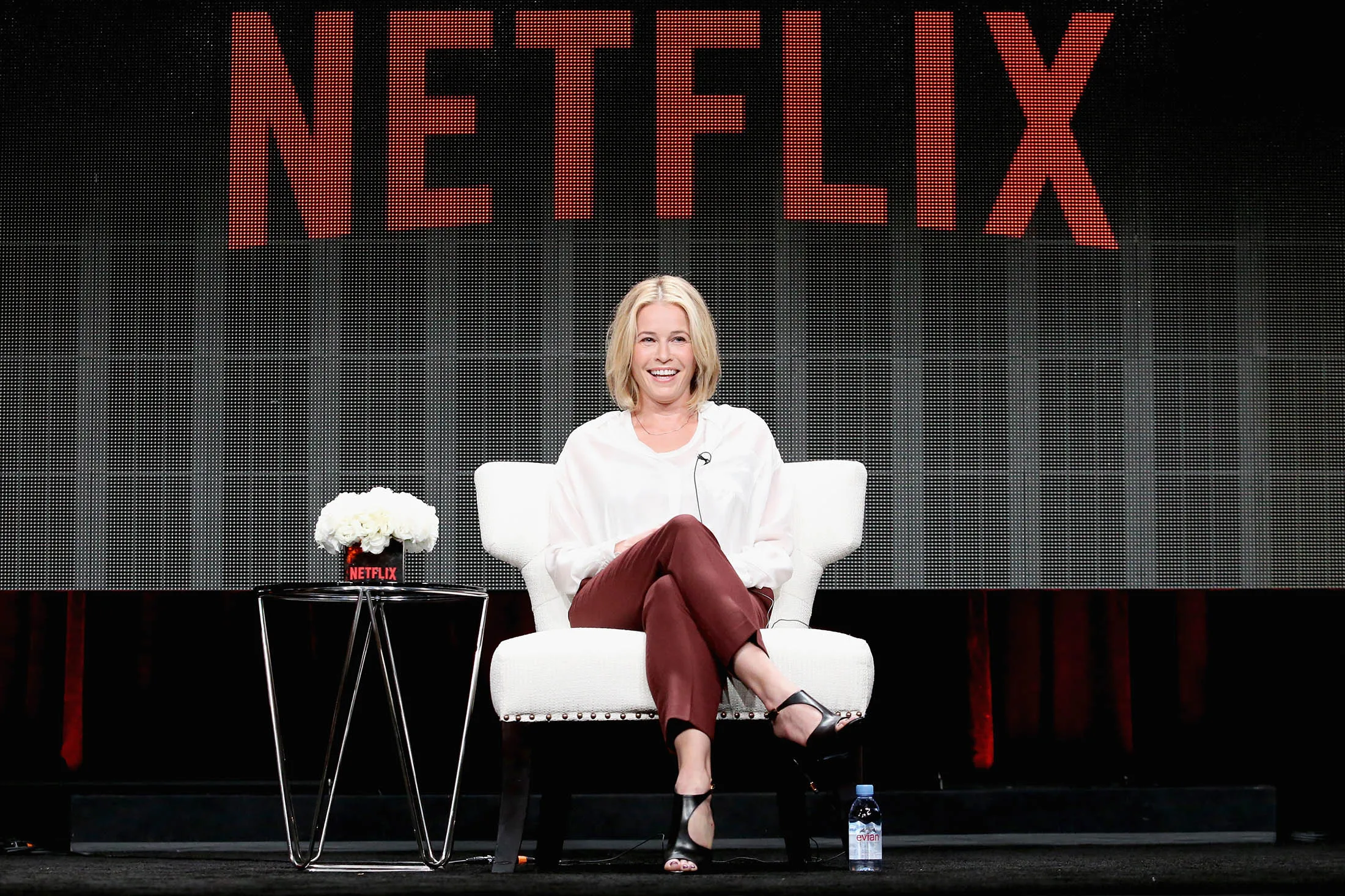 Comedian Chelsea Handler speaks onstage.

