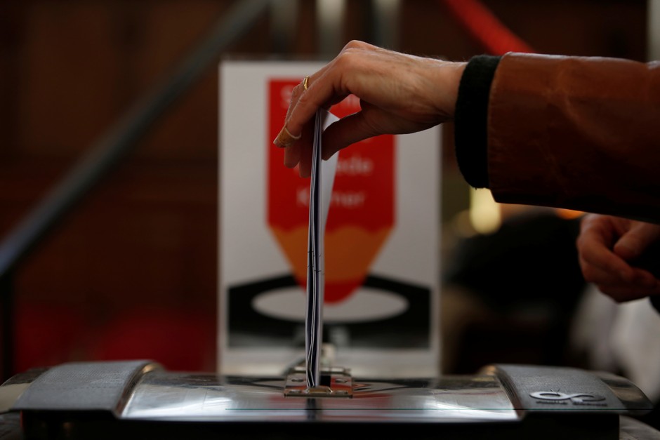 A voter casts a ballot during the general election in Amsterdam, Netherlands, March 15, 2017.