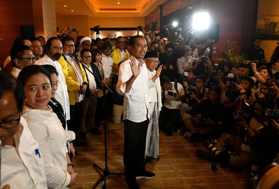 Jokowi Set to Win Second Term in Indonesia Vote, Calls for Unity