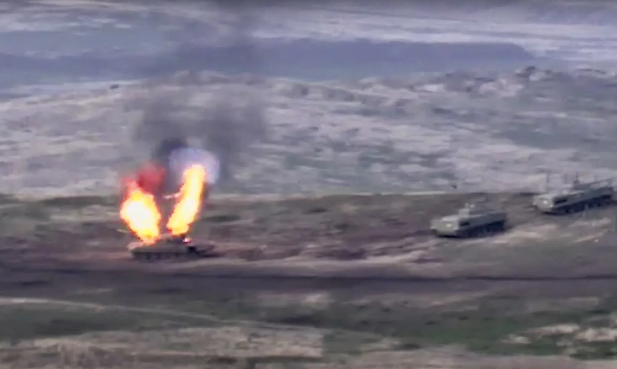 In this image taken from a footage released&nbsp;Sept. 27,&nbsp;Armenian forces destroy an Azerbaijani tank at the contact line of the self-proclaimed Republic of Nagorno-Karabakh.