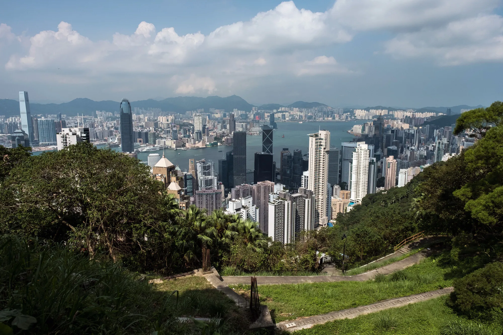 Residential and commercial buildings are seen from Victoria Peak in Hong Kong, China, on Monday, Sept. 11, 2017. Hong Kong stocks fluctuated on Sept. 12 as automakers extended gains driven by China's plan to phase out fossil-fuel vehicles, while banks and property companies weighed on the benchmark index.