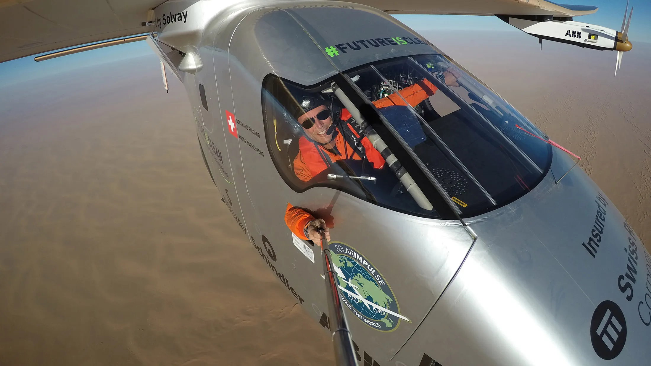 Swiss pioneer Bertrand Piccard takes a selfie during the last leg of the round the world trip with Solar Impulse 2 over the Arab peninsula prior to the landing in Abu Dhabi to finish the first around the world flight without the use of fuel on July 25, 2016 in Abu Dhabi, UAE.
