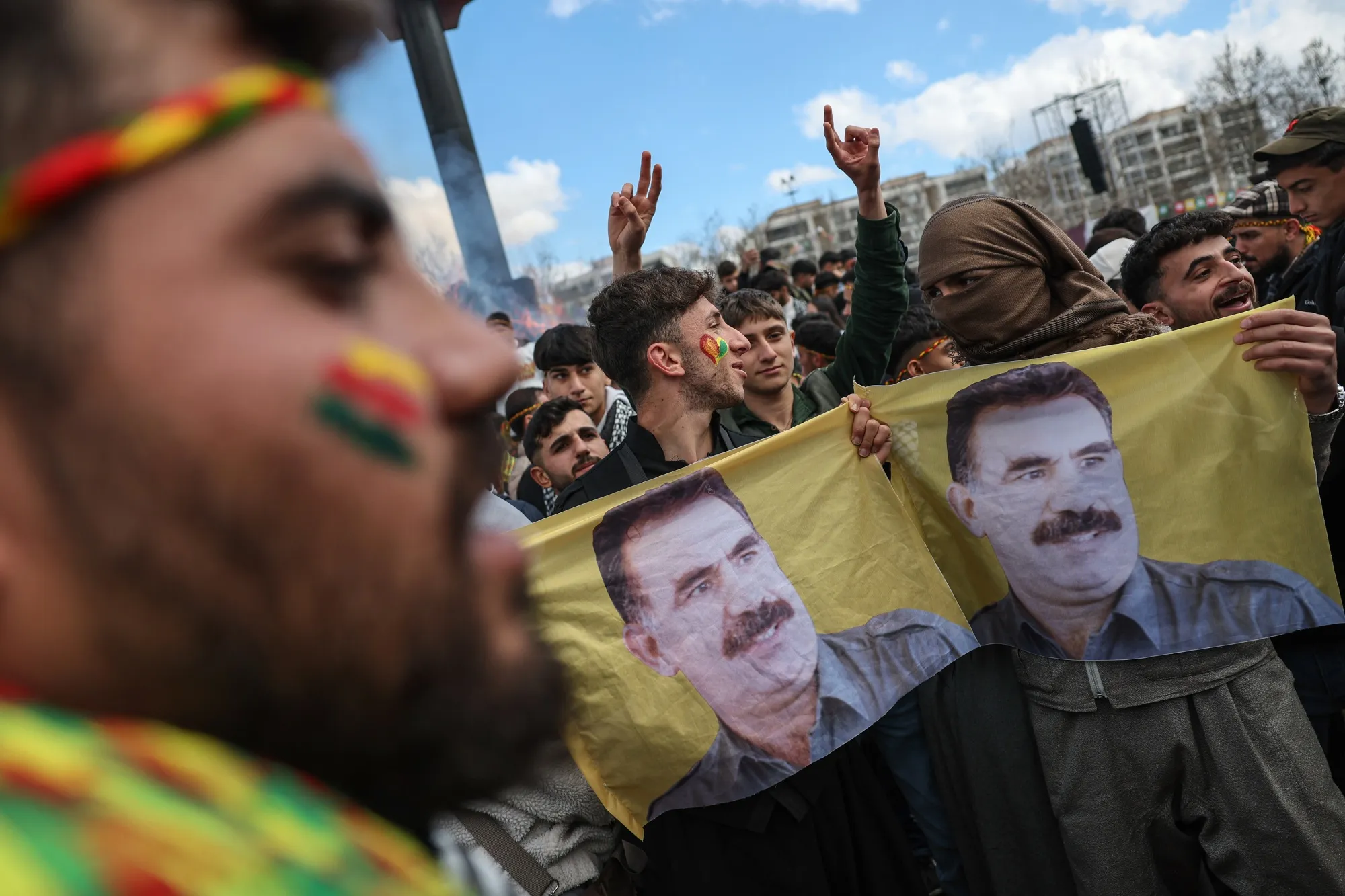 Ethnic Kurds hold a poster of Abdullah Ocalan during Newroz celebrations in Diyarbakir, Turkey, on March 21.