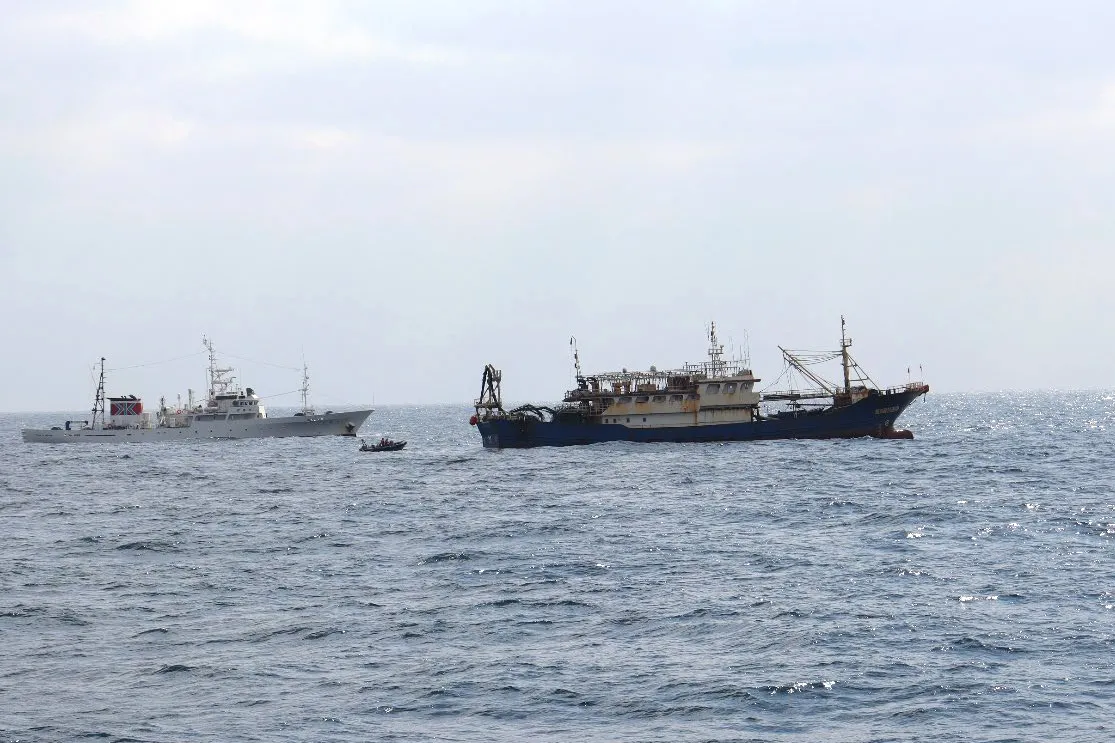 The Chinese fishing boat, right, seized by Japan’s Fisheries Agency's vessel.