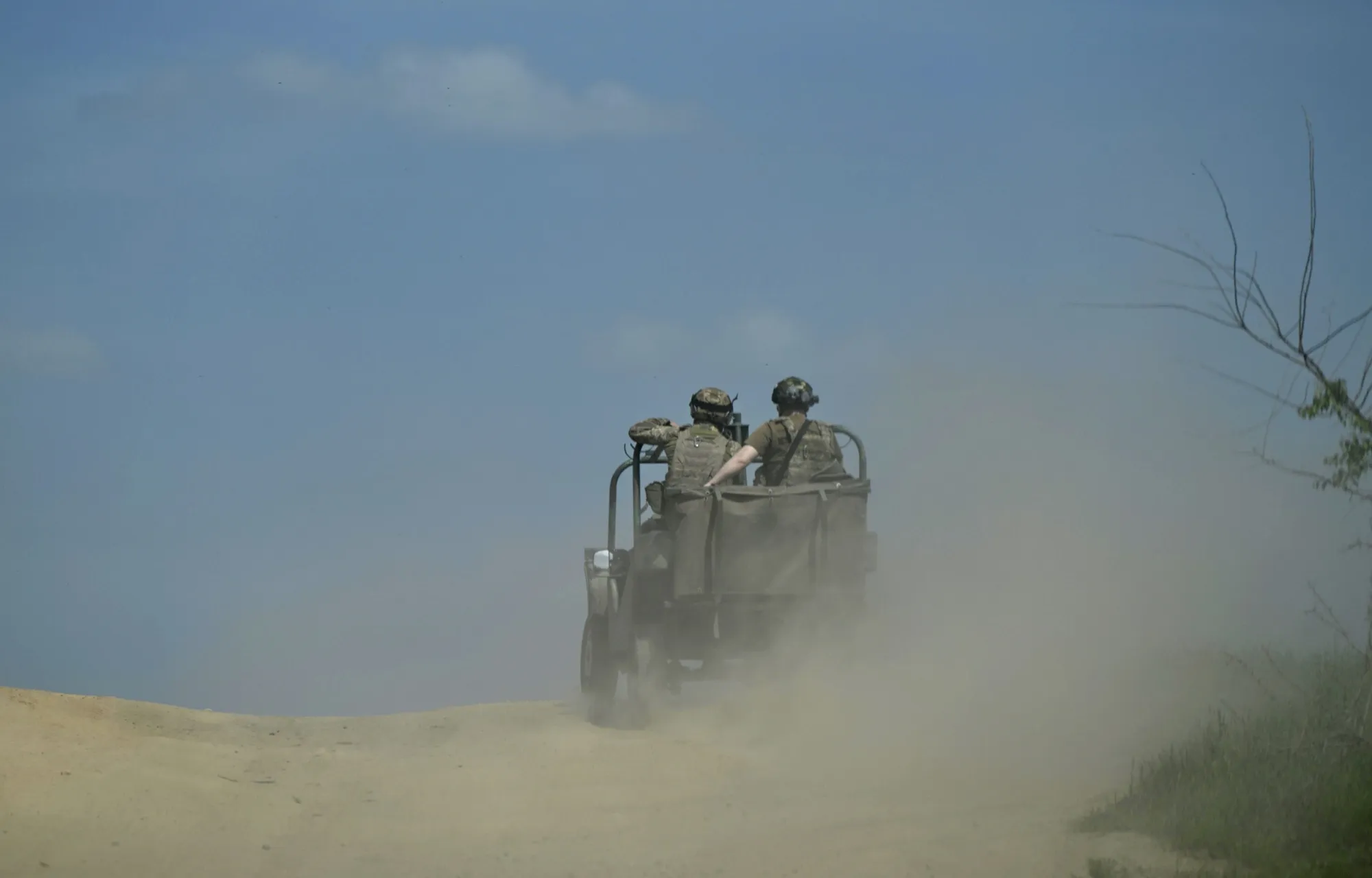 Ukrainian servicemen ride a buggy&nbsp;near Chasiv Yar, Donetsk region, on April 27.