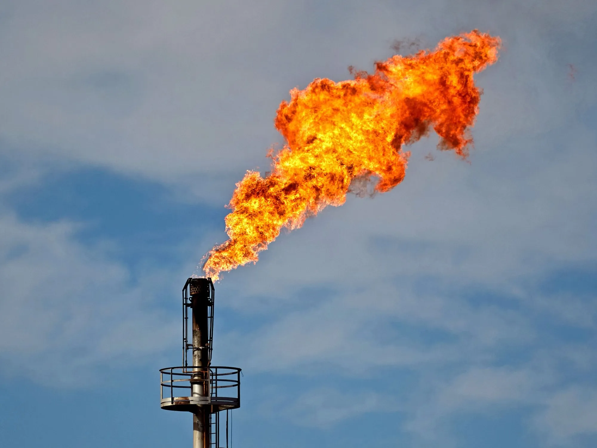 A gas flare in shale patch Vaca Muerta in Anelo, Argentina.
