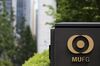 The logo of Mitsubishi UFJ Financial Group Inc. (MUFG) is displayed outside of the company's headquarters in Tokyo.