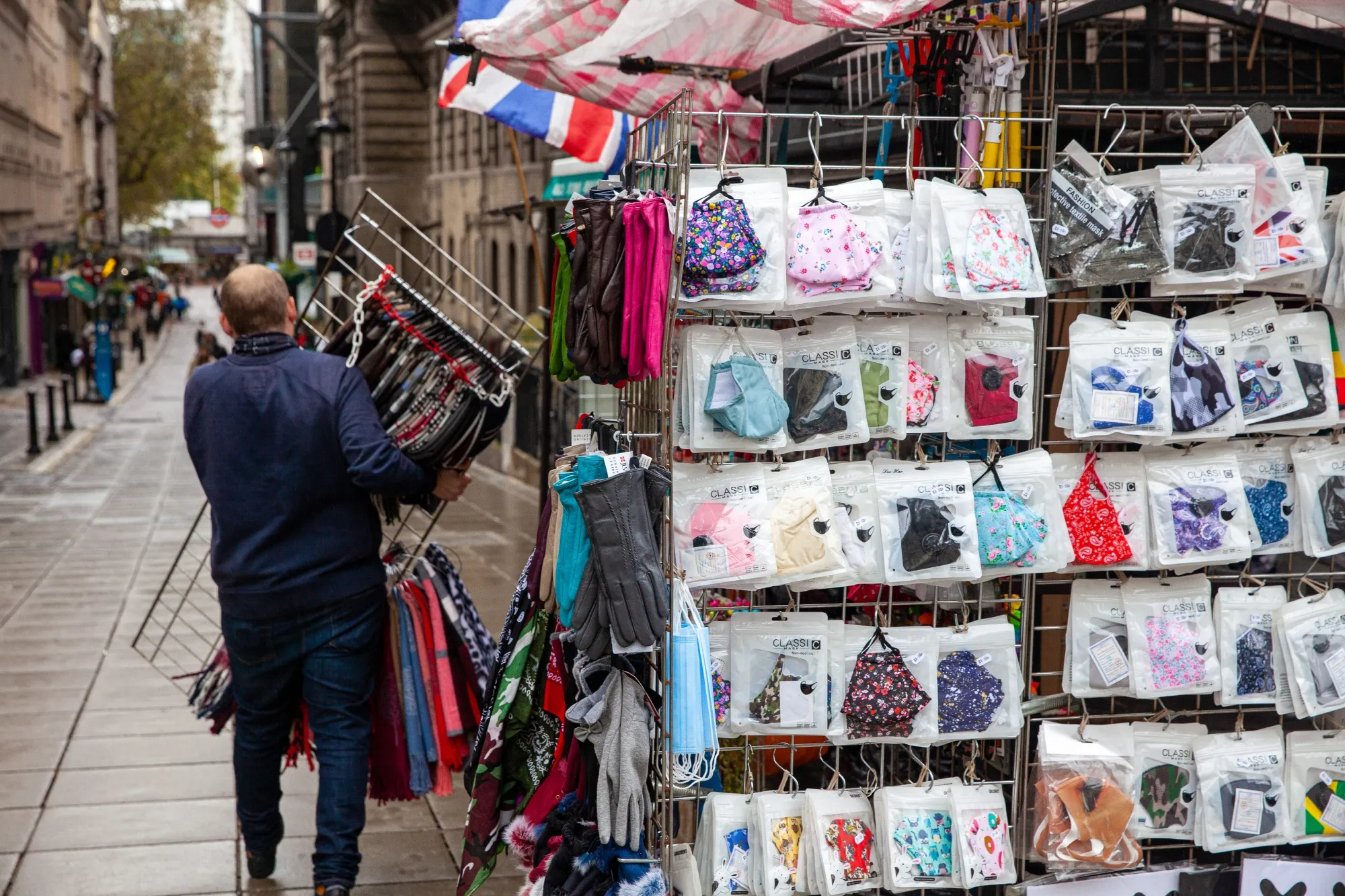 A market trader sets up his stall selling face masks in London.&nbsp;The U.K.’s death toll now stands at 45,365.