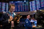 Trading On The Floor Of The NYSE As Stocks Fluctuate