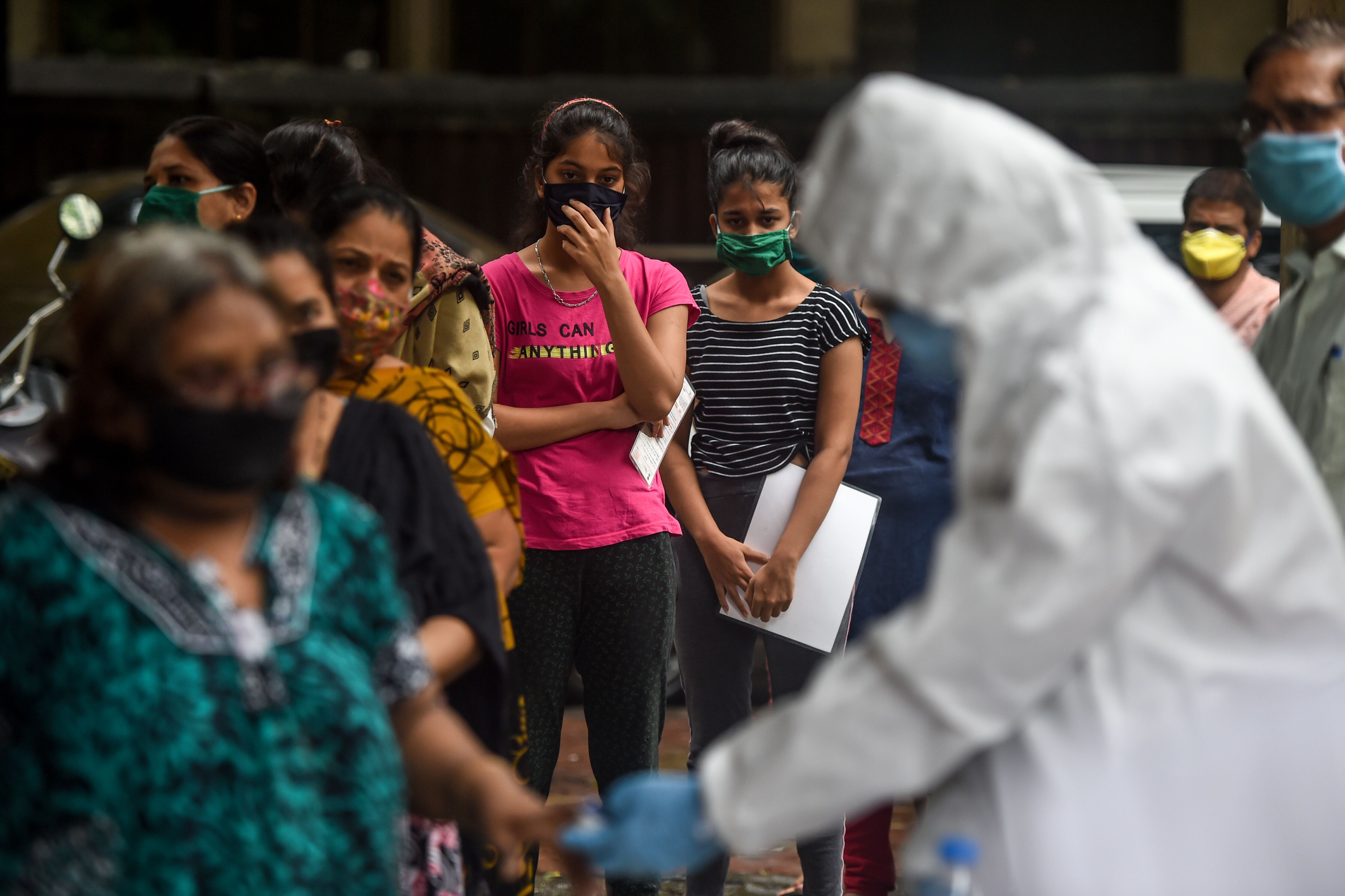 Residents queue up to get tested for the Covid-19 in Mumbai on July 16.