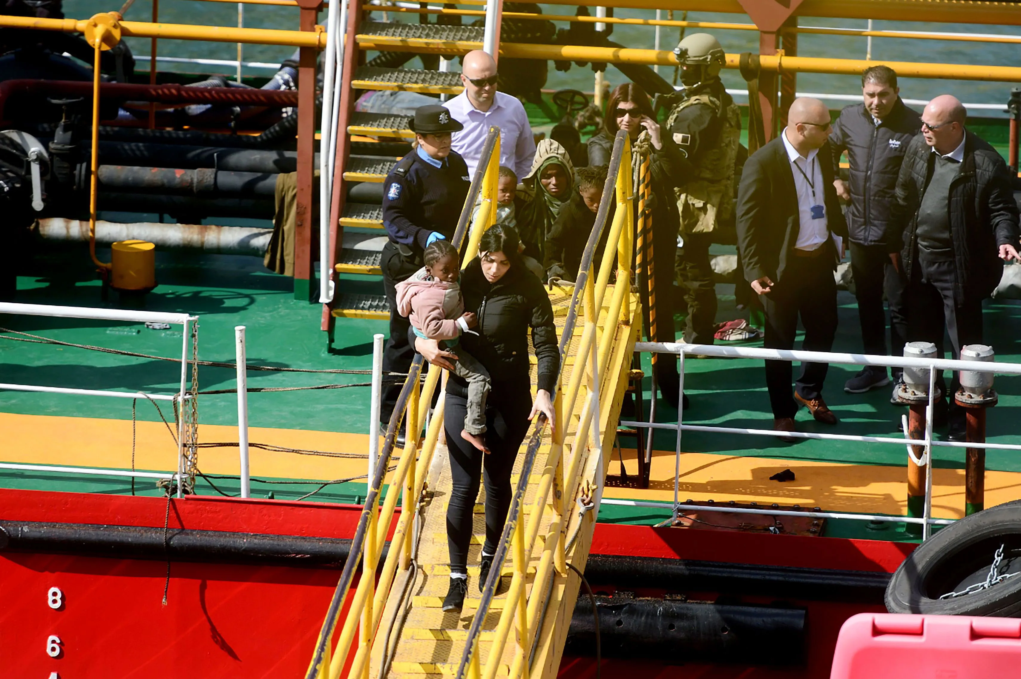 Migrants disembark from the El Hiblu 1 in Valletta on March 28.