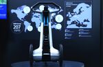 An ILY-A Future Personal Mobility Vehicle sits on display in the Aisin Seiki Co. Ltd. pavilion at the CeBIT 2017 tech fair.