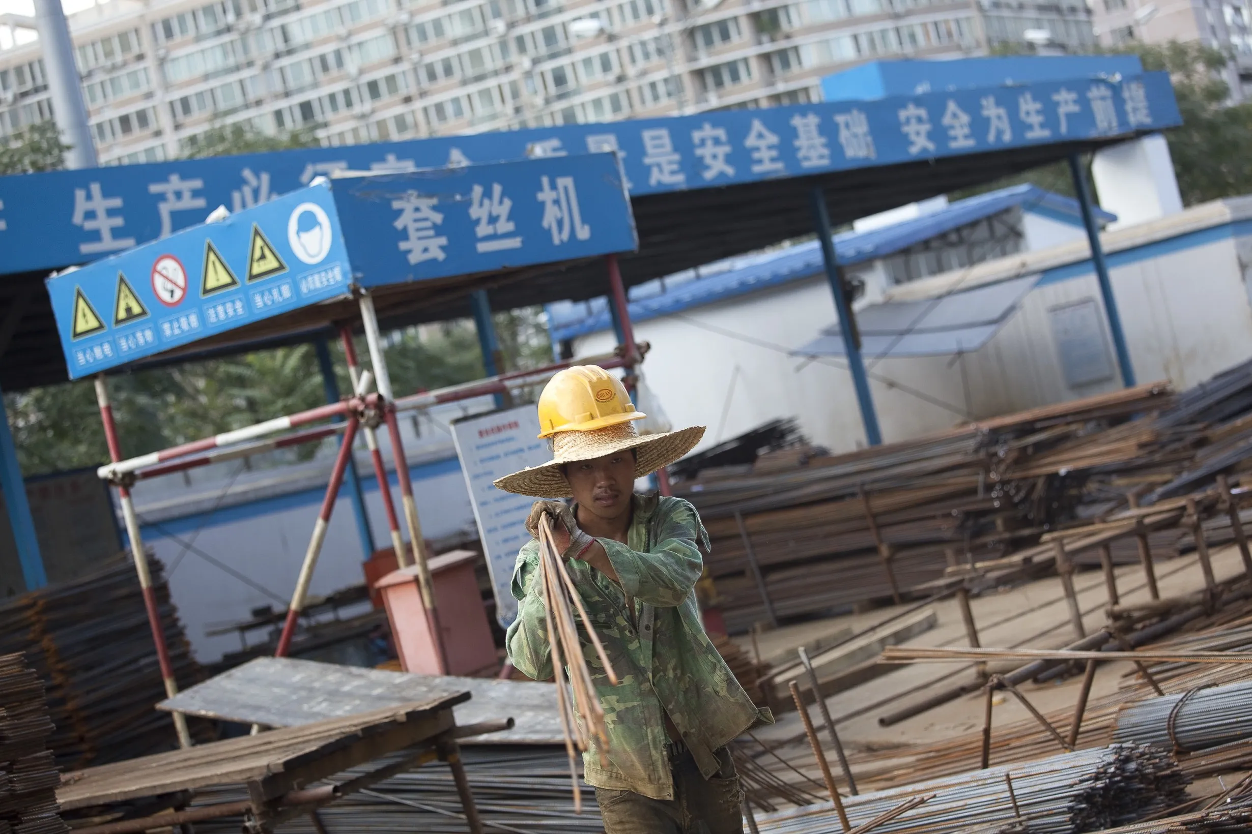A man works on a property construction site in Beijing, China.