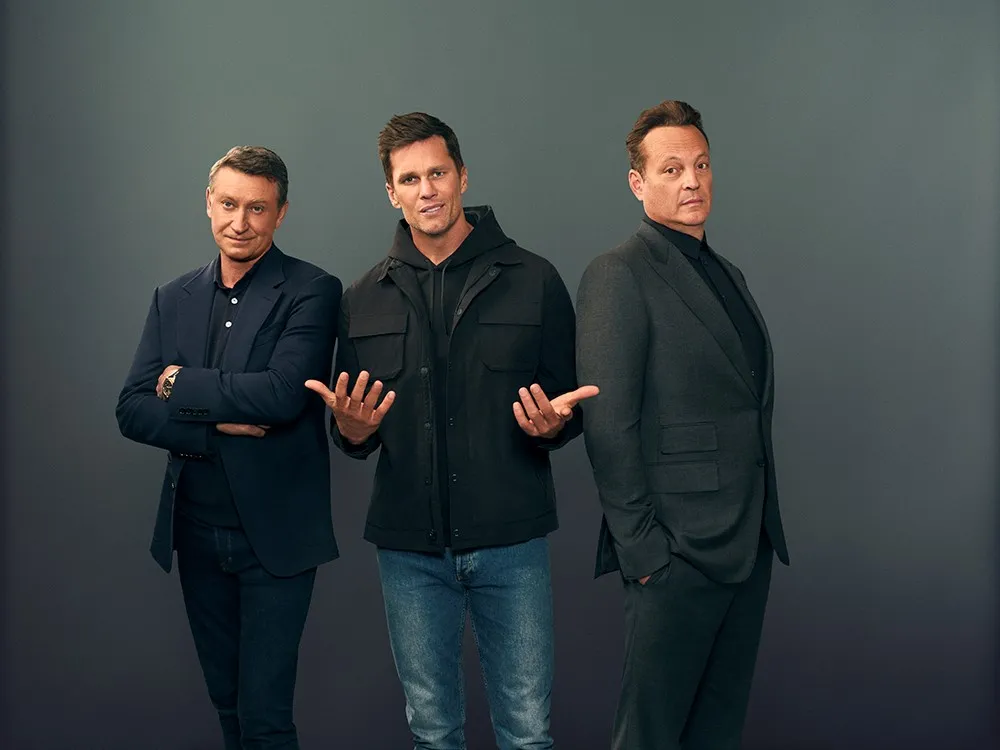 NFL great Tom Brady, center, will star in a Super Bowl ad for BetMGM with hockey superstar Wayne Gretzky, left, and actor Vince Vaughn.