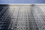 Stock price figures sit on display inside the Frankfurt Stock Exchange.
