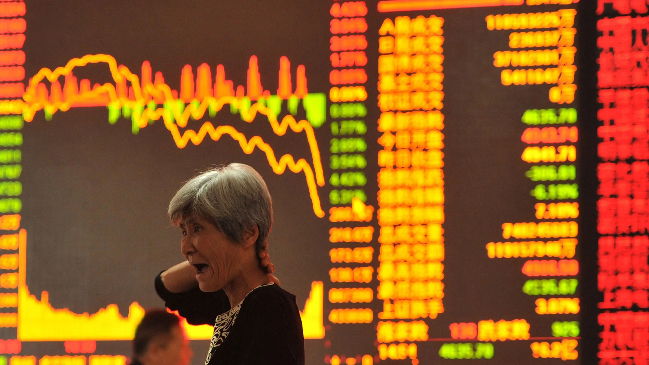 A stock investor at a security firm in Fuyang, east China's Anhui province.
