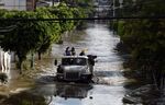 Members of the Mexican Navy patrol along flooded streets in Tula de Allende,&nbsp;Mexico, on Sept. 9.