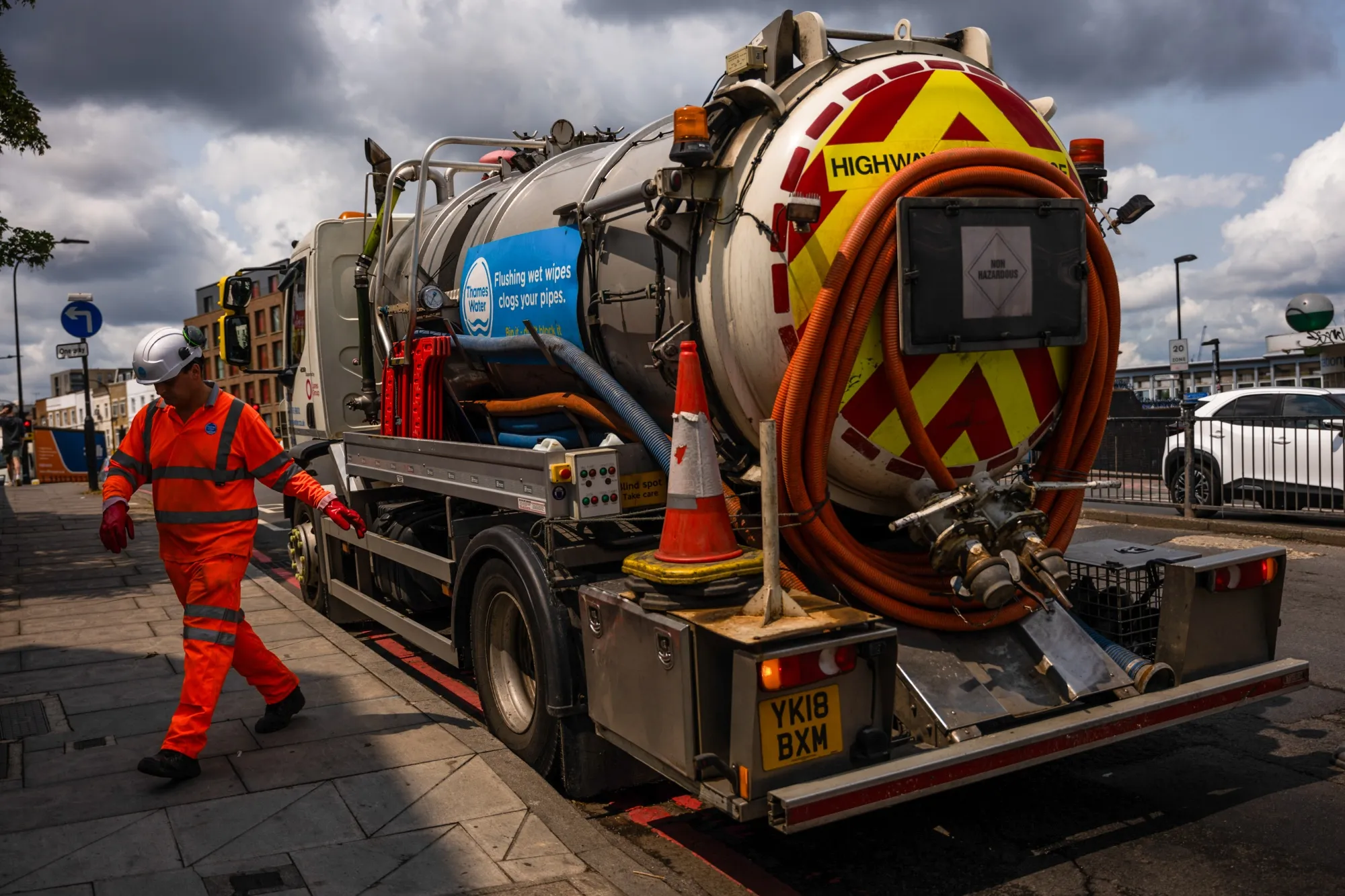 A maintenance engineer works at a Thames Water incident site in London, UK.