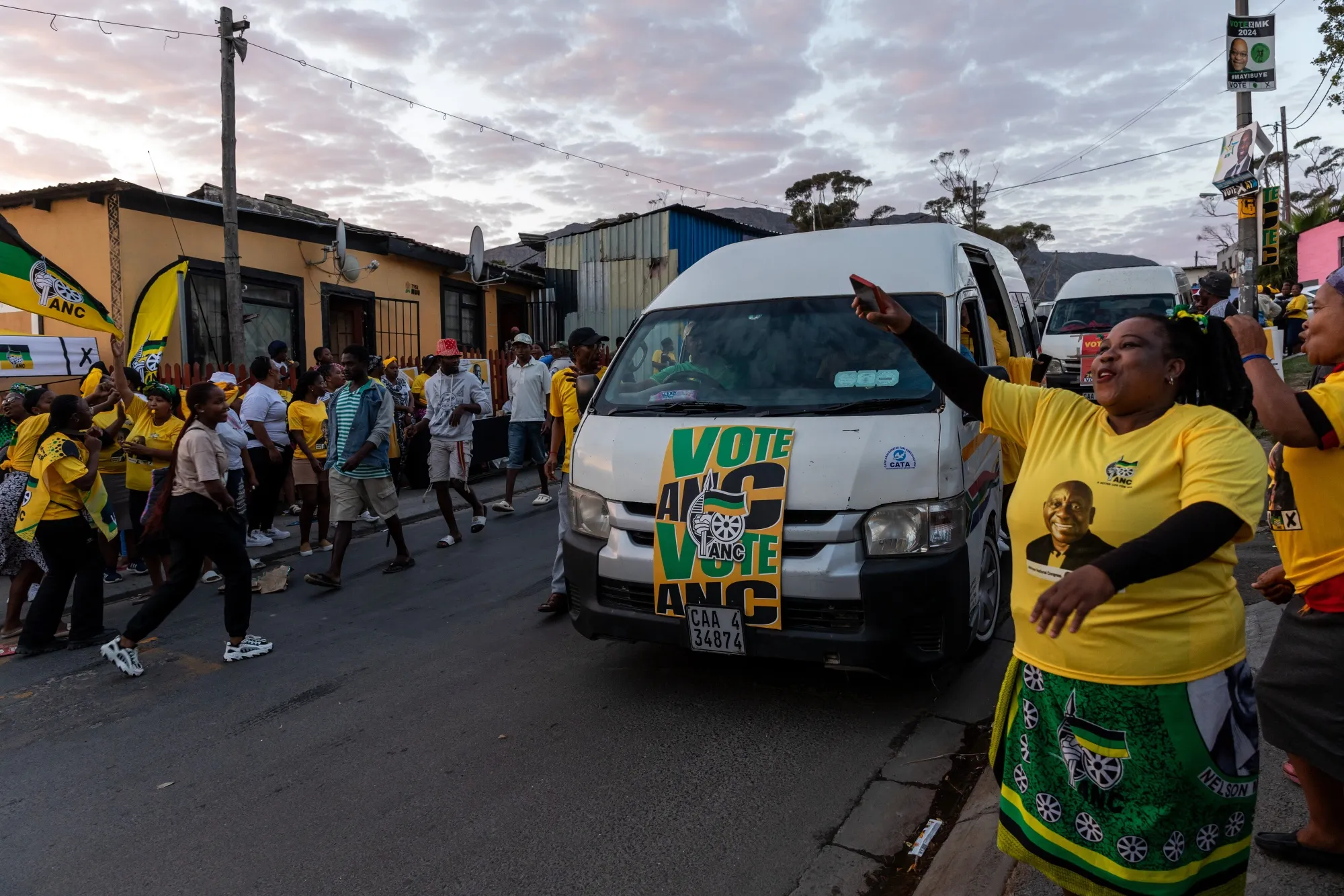 Supporters of the African National Congress (ANC) outside the Iziko Lobomi community centre polling station in Imizamo Yethu, South Africa, on&nbsp;May 29.