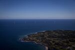 The GE-Alstom Block Island Wind Farm stands in the water off Block Island, Rhode Island.