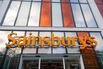 A sign above the entrance to a Sainsbury's supermarket in London.