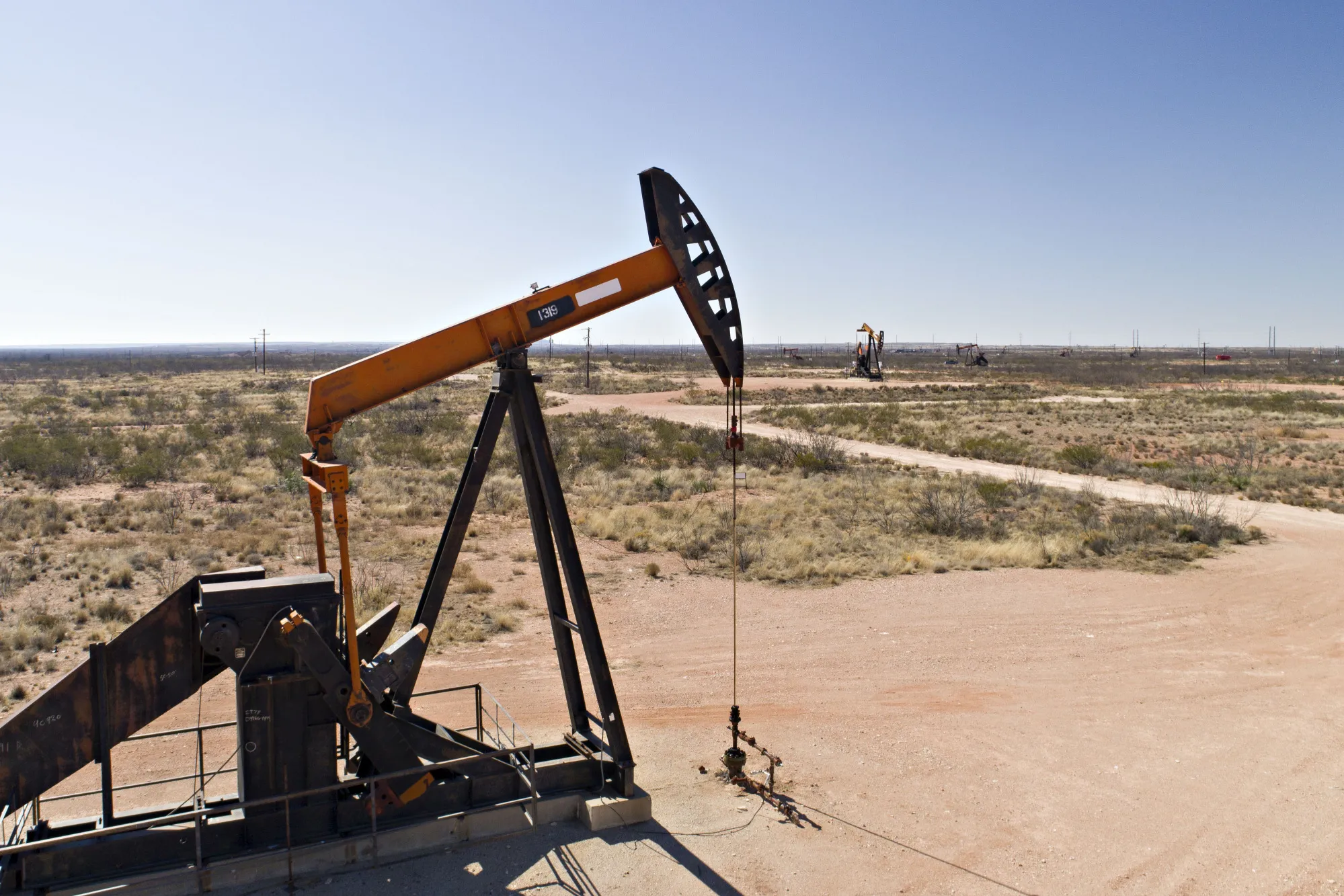 Pumpjacks operate on oil wells in the Permian Basin in&nbsp;Crane, Texas.