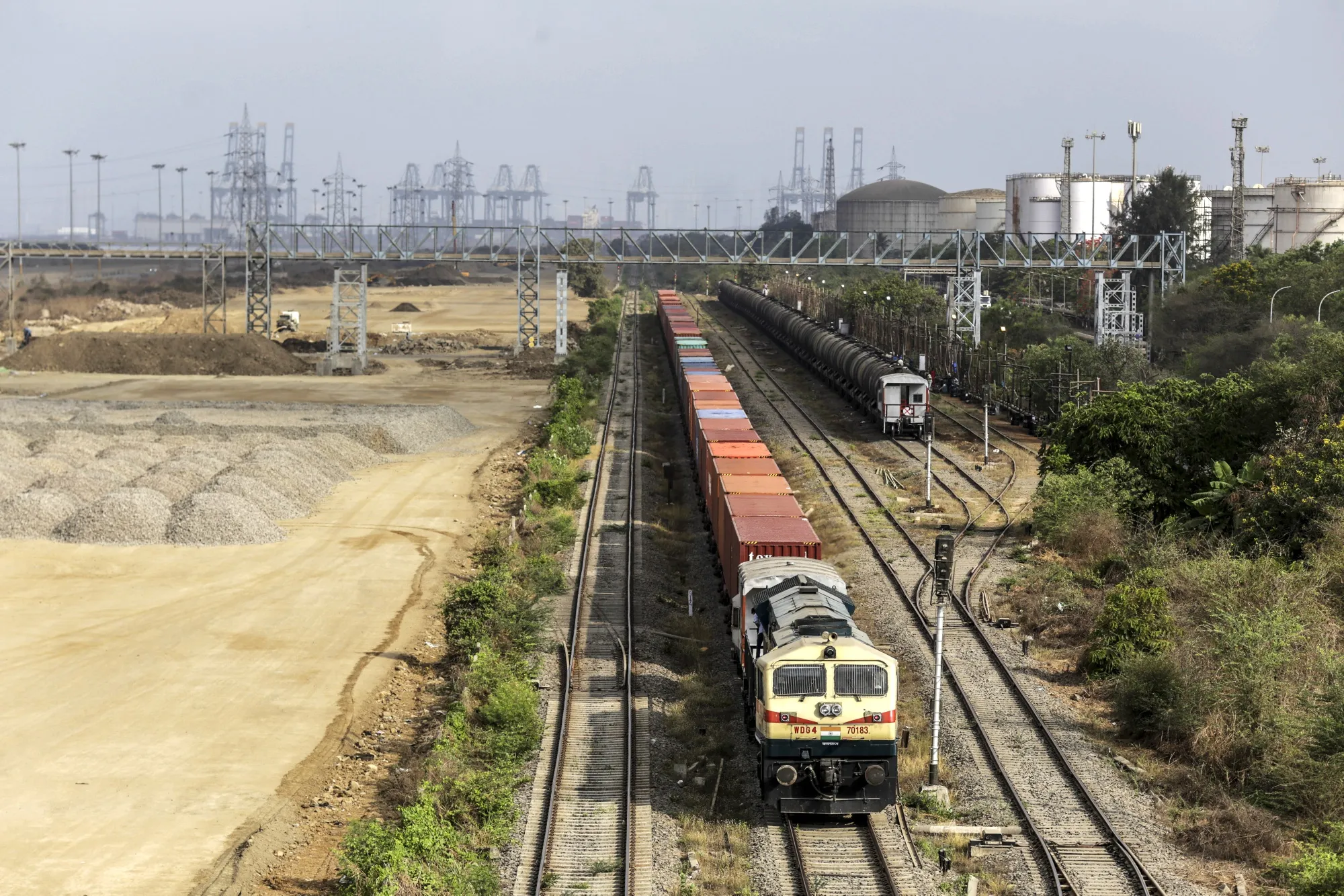 A train carrying shipping containers&nbsp;in Navi Mumbai, Maharashtra, India.