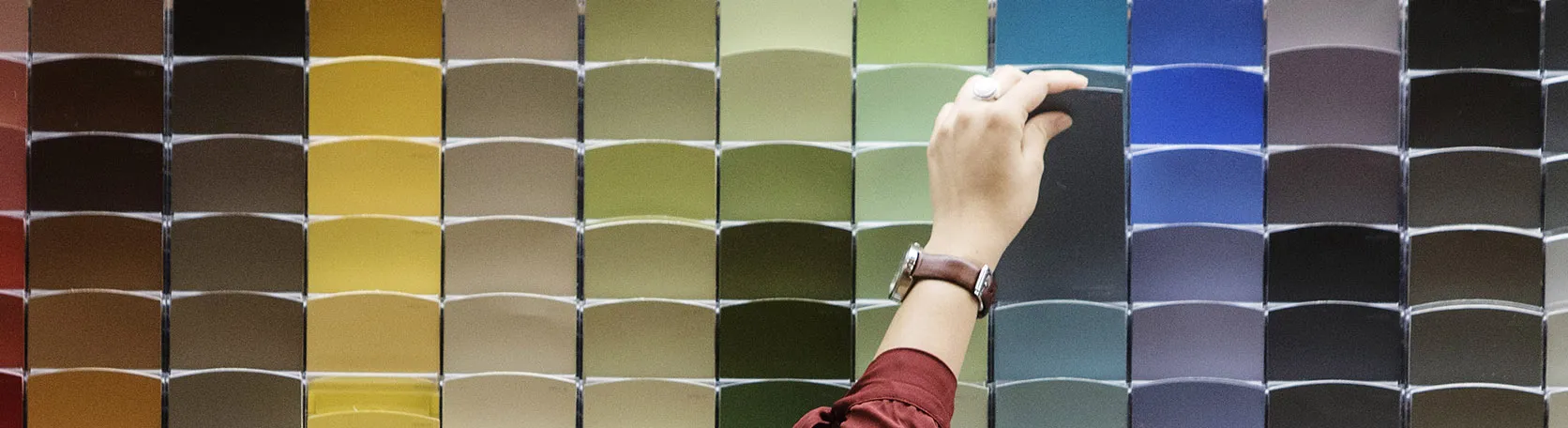 A customer looks at paint samples at a Home Depot Inc. store in New York, U.S., on Friday, Aug. 11, 2017. Home Depot Inc. is scheduled to release earnings figures on August 15.